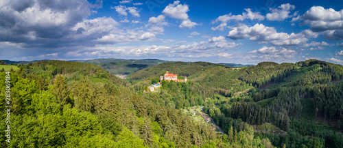 Pernstejn Castle is a castle on a rock above the village of Nedvedice and the rivers Svratka and Nedvedicka, some 40 kilometres (25 mi) northwest of Brno, in the South Moravian Region, Czech Republic. photo