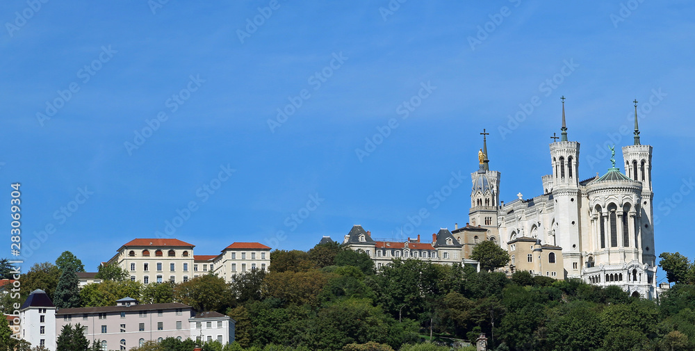 above the hill is the church of Notre Dame de fourviere in Lyon