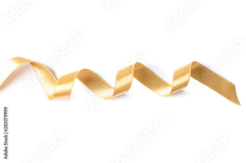 Gold ribbon isolated on white background. Gift concept