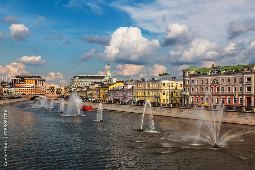 View of the Vodootvodny Canal with fountains and Kadashevskaya Embankment on a summer day, Moscow, Russia