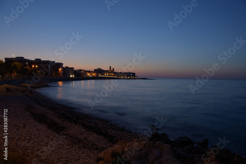 View of city of Giovinazzo at sunset © Famed01