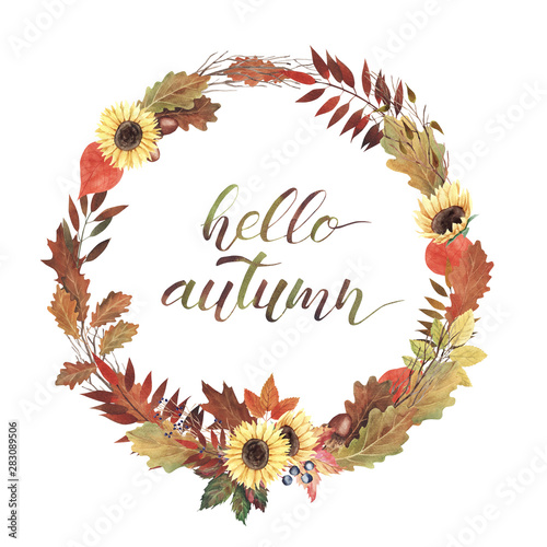Watercolor wreat with beautiful red, orange and yellow autumn leaves and berries. Hand written lettering Hello autumn.