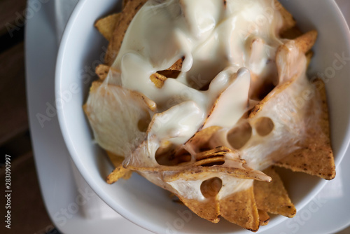 Nachos chips with melted cheese