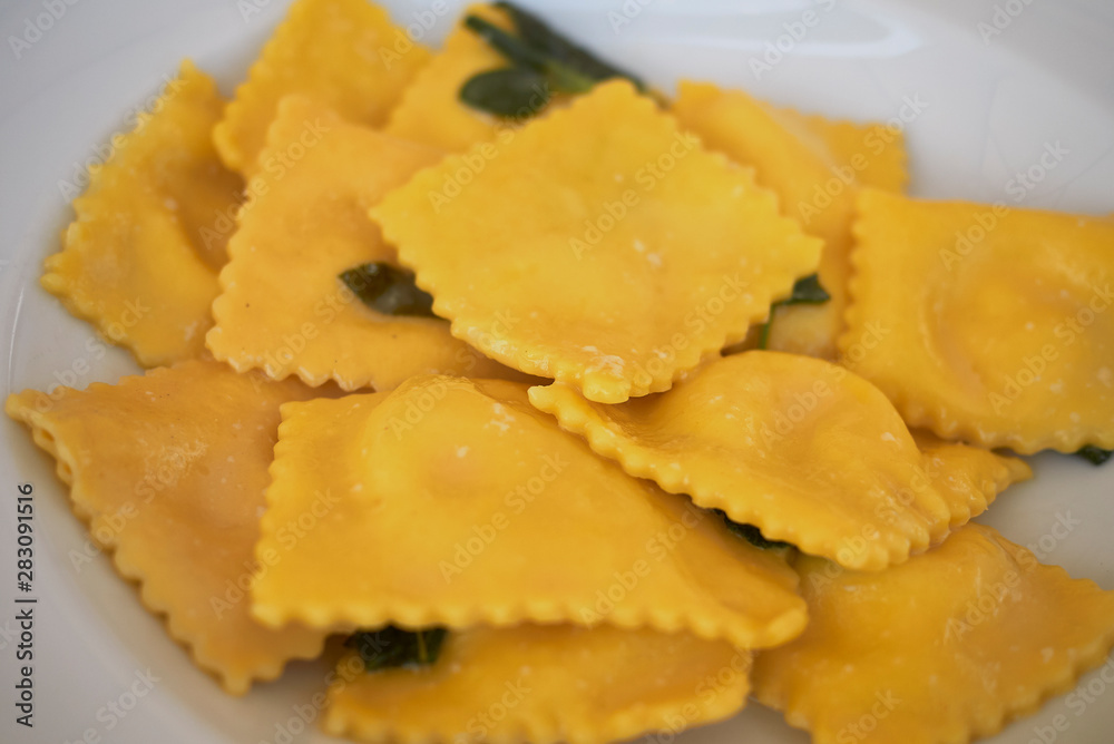 Ravioli pasta with butter and sage