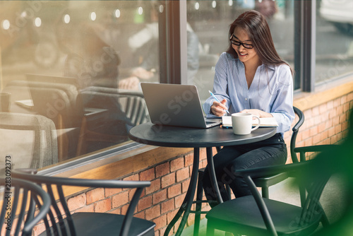Create opportunities. Concentrated girl working outdoors. Concept of female freelancer business. Copy space on the left side
