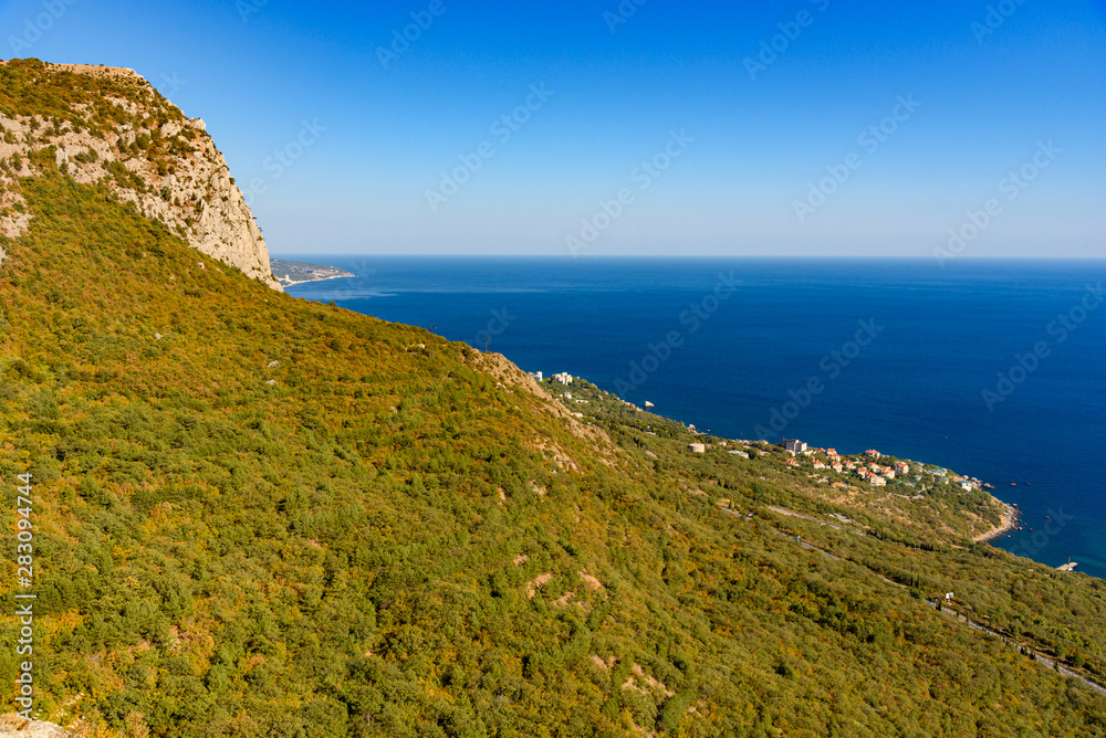 view of the Black Sea city of Foros from the height of the mountain, on a bright sunny cloudless day.