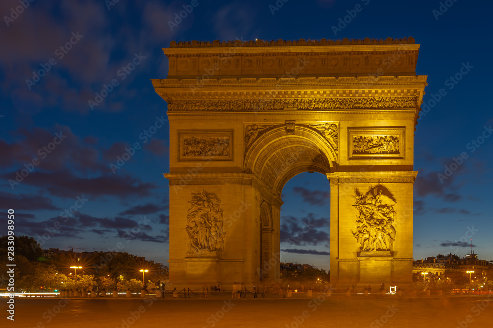 Paris, France - 08 07 2019: Triumphal Arc of Paris at sunset