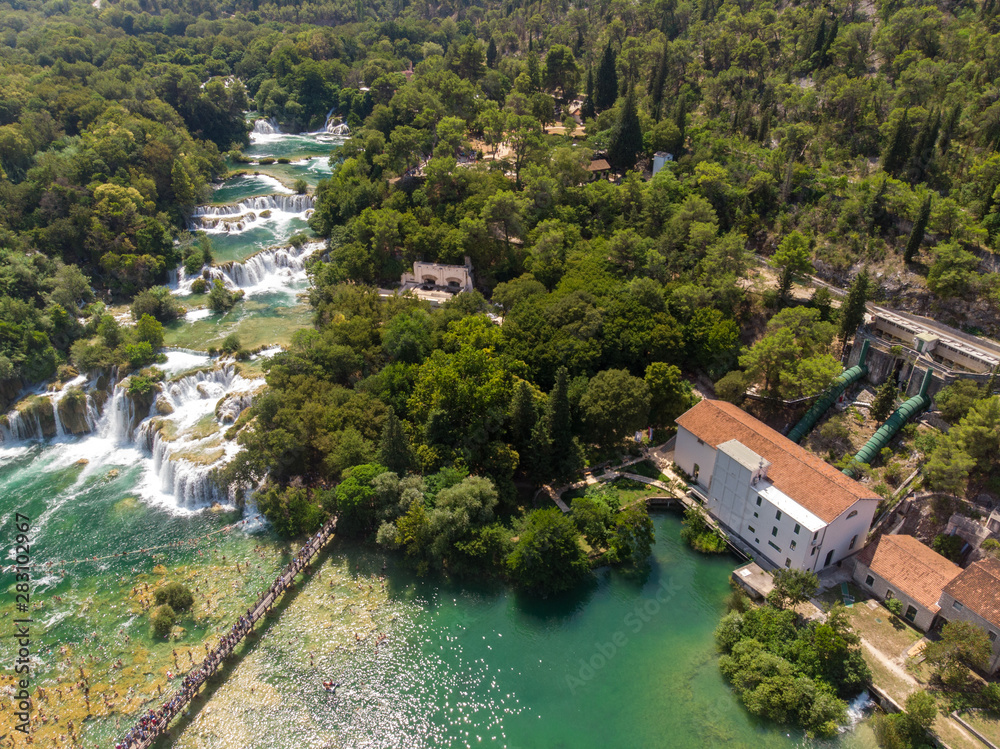 Aerial view of waterfalls in Krka National Park, one of the most famous national parks and visited by many tourists.Skradinski Buk:KRKA NATIONAL PARK,CROATIA, August 2019