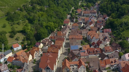 Wallpaper Mural Aerial view from the old part of the city Ingelfingen in Germany.  Camera zooms out slowly over town, and then tilts down to overhead shot next to New Palace Ingelfingen and  over palace gardens. Torontodigital.ca