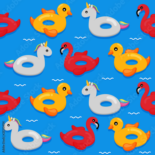 colorful inflatable swimming seamless pattern. flamingos  duck and unicorn shape. summer items isolated on blue background. vector Illustration.