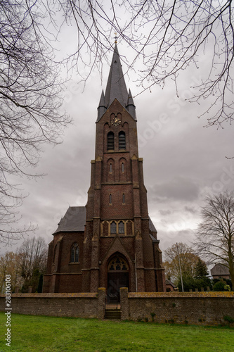 St. Martin church, Griethhausen, Kleve, Germany on a cloudy day in springtime