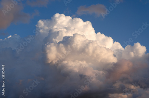 Cumulonimbus stormy cloud on blue sky
