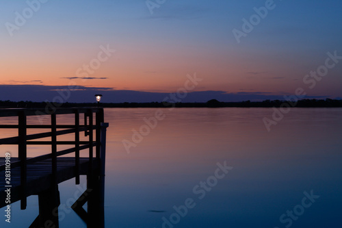 wooden pier at sunset © sarah