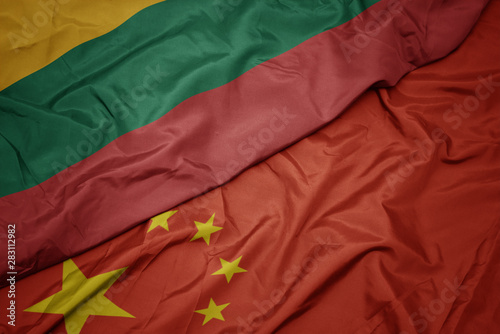 Canvas Print waving colorful flag of china and national flag of lithuania.