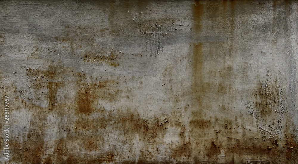 Gloomy grey wall with rust stains on the metal surface - background. Grunge wall. Gloomy grey wall with rust stains on the metal surface - background. Grunge wall.