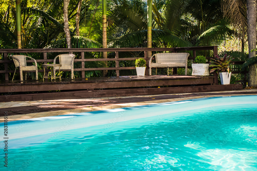 Fototapeta premium swimming pool in garden resort