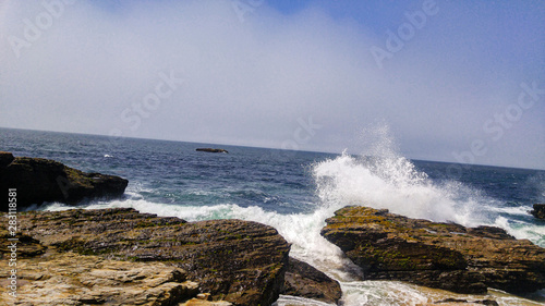 waves crashing on rocks