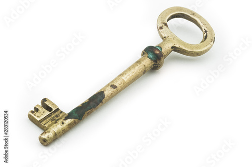 Antique vintage key macro on white background