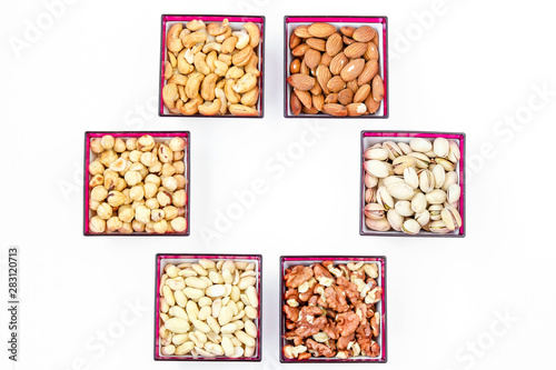 Different types of nuts: peanuts, cashews, almonds, hazelnuts, walnuts and pistachios, horizontal orientation, copy space, top view