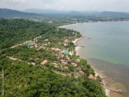 Aerial view of luxury resort with private villas and pools next the beach and ocean. Phu Quoc, Vietnam