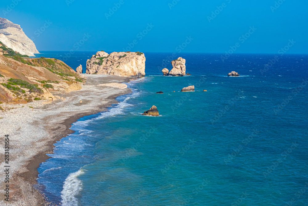 Cyprus. Mediterranean sea. Rock Of Aphrodite. The Beach Of Aphrodite. Kuklia. Petra-Tu-Romiou. The legend of the birth of the goddess of love in Cyprus. Mediterranean vacation.