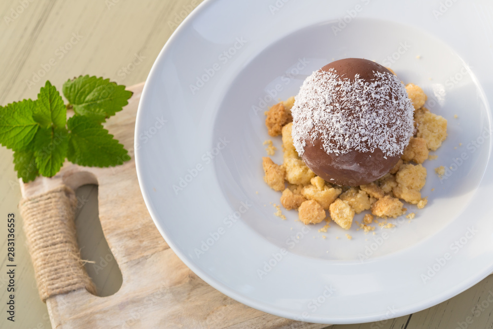 Chocolate ball lava with Chocolate Fondue, Sweet dessert Chocolate ball lava with Chocolate Fondue, Sweet dessert