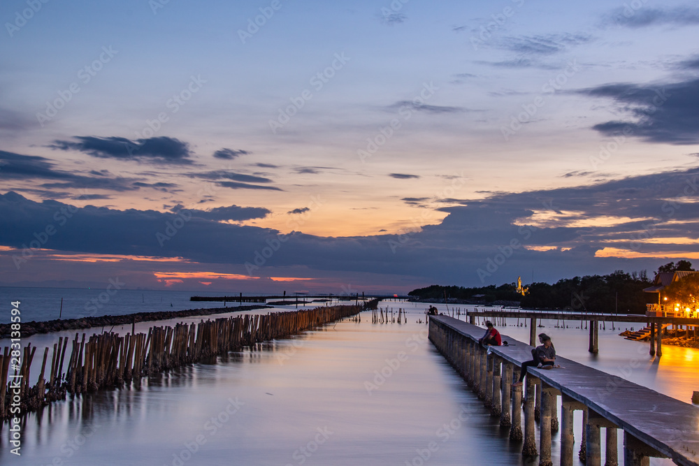 Beautiful of The walkway bridge in evening at Bang Khun Thian sea view, Bang Khun Thian, Bangkok.