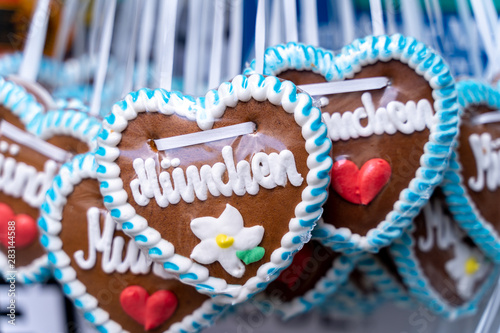 Oktoberfest Gingerbread heart with Munich Letters. October festival is a seasonal beer event in Munich (Germany). Traditional heart cakes.