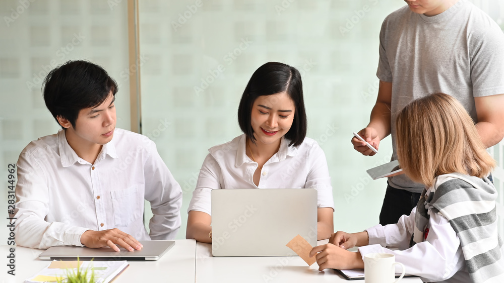 Young team of business meeting with laptop in office workplace. Young team of business meeting with laptop in office workplace.