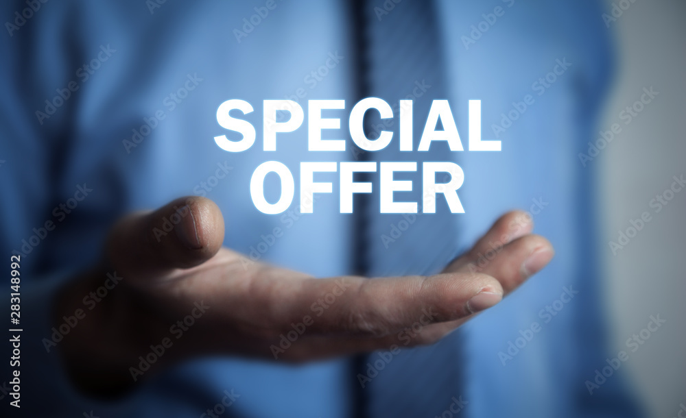 Businessman holding Special Offer text. Business concept Businessman holding Special Offer text. Business concept