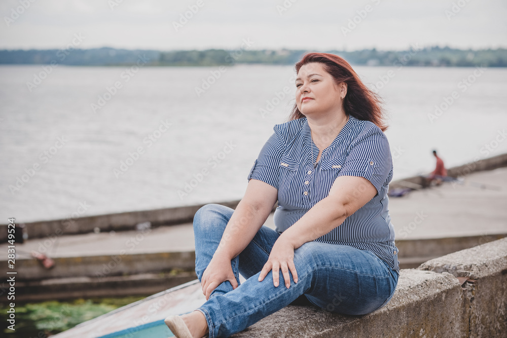 Relax concept. Plus size model, Woman rest at nature, attractive plump lady enjoy the life