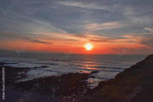 Summer sunset at crooklets beach bude cornwall