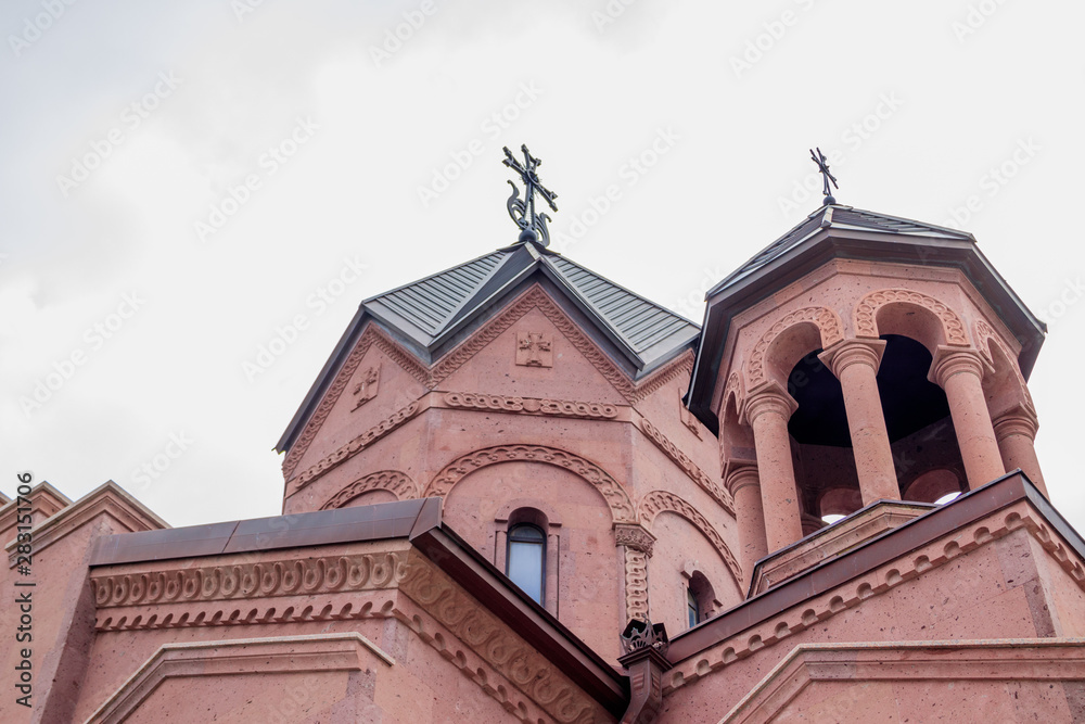 Fototapeta premium Armenian temple in Russia. Faith in God. Temple of red stone. Armenian temple in Anapa. Buildings and architecture. Public place