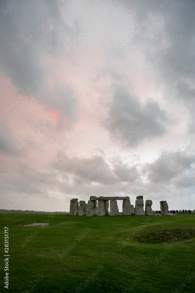 Red and blue mystic sky over the Stonehenge, England