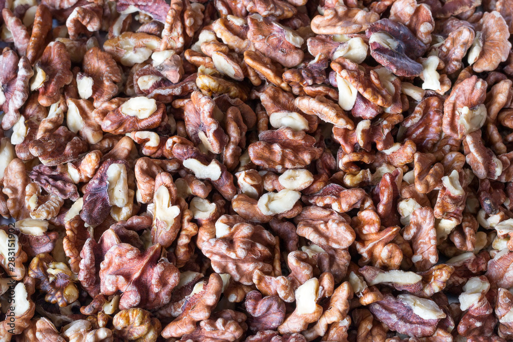 Walnuts kernels top view background. Healthy eating concept. Walnuts kernels top view background. Healthy eating concept.