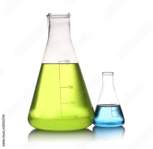 Erlenmeyer flasks with color liquids isolated on white. Solution chemistry