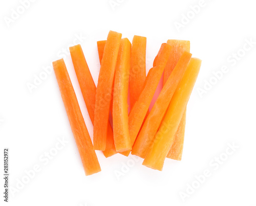 Murais de parede Pile of fresh carrot sticks isolated on white