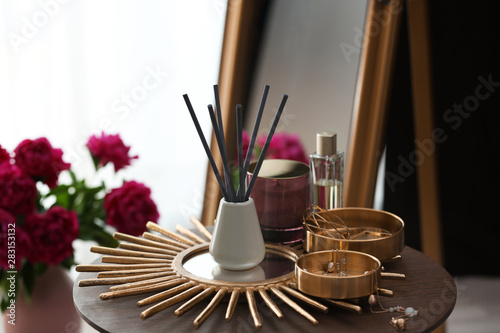 Composition with stylish accessories and interior elements on table indoors