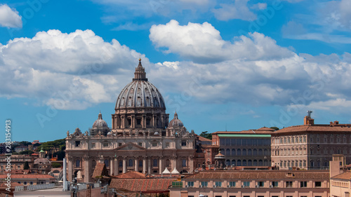 Obraz na płótnie Beautiful aerial view on the St. Peter's Basilica ( Famous Roman landmark ) and ancient classical buildings of the Vatican on background of clouds. City of Rome. Italy. Europe w salonie