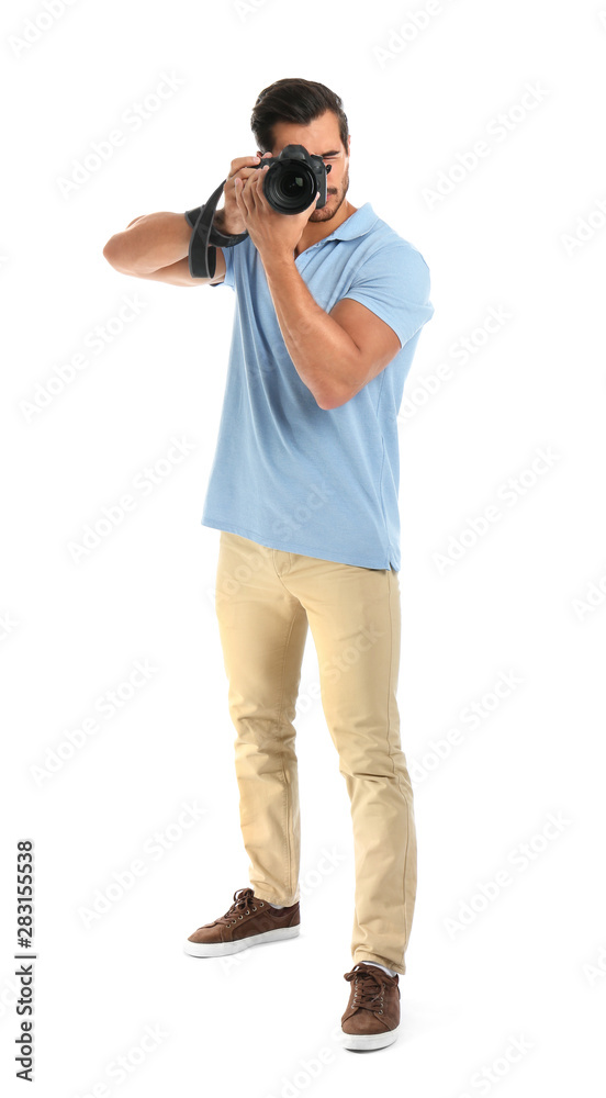 Young professional photographer taking picture on white background Young professional photographer taking picture on white background