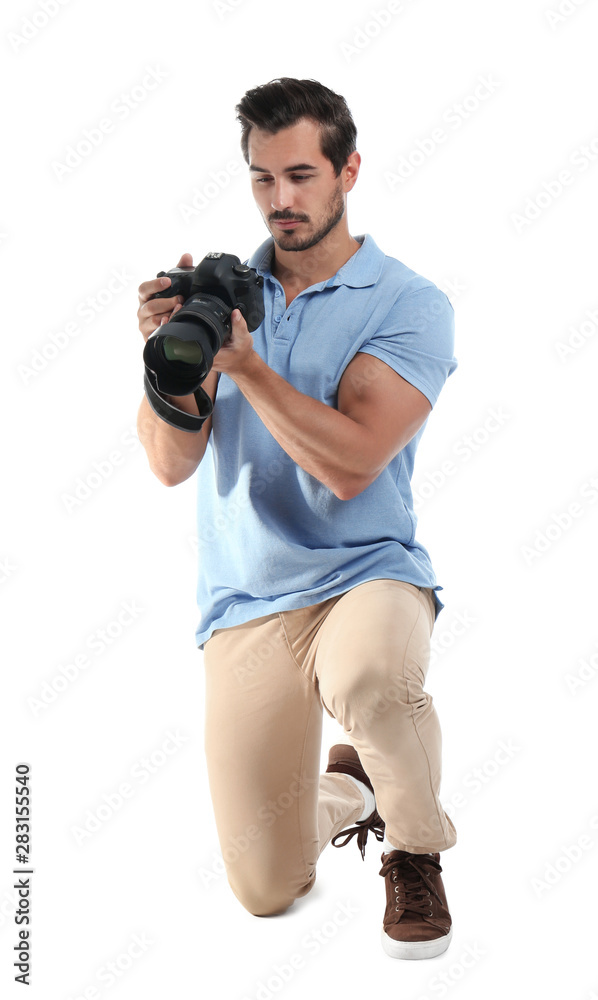 Young photographer with professional camera on white background Young photographer with professional camera on white background