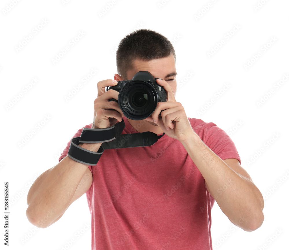 Young professional photographer taking picture on white background Young professional photographer taking picture on white background