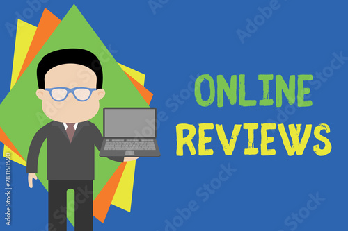 Text sign showing Online Reviews. Business photo text Product evaluation Customer feedback publish in the website Standing man in suit wearing eyeglasses holding open laptop photo Art © Artur