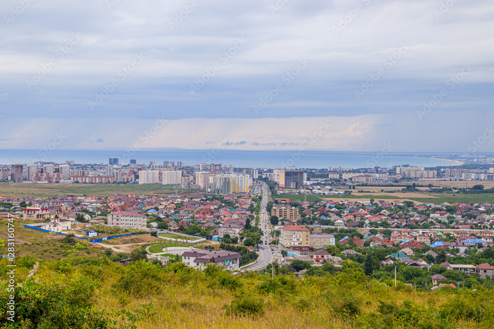 View of Anapa. View of the resort city. The vastness of Russia. Russian southern city. City from above. Many houses .. Buildings and architecture