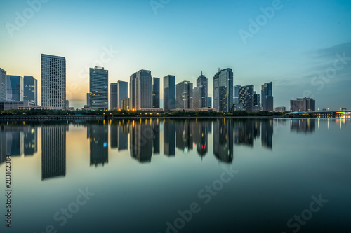 urban skyline and modern buildings at dusk  cityscape of China.