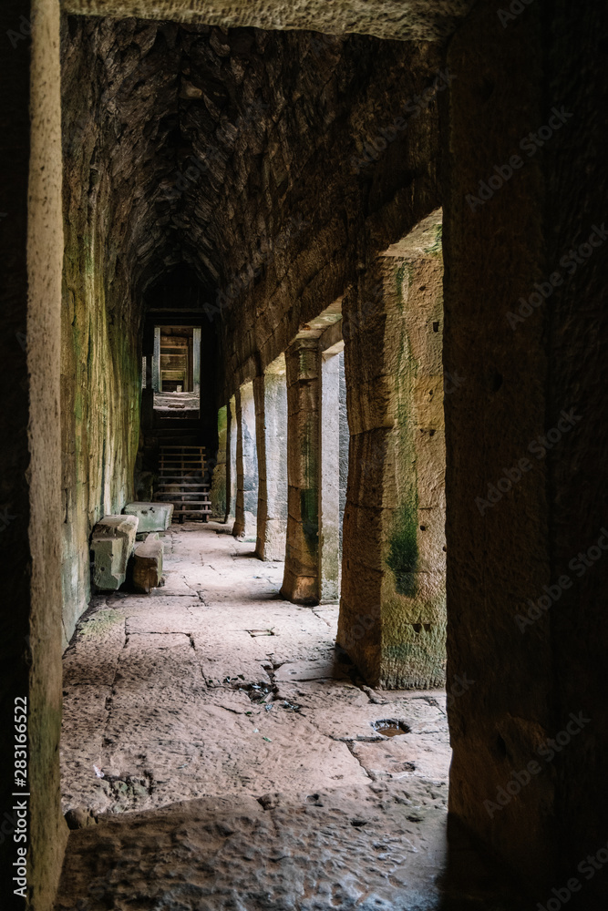 Corridor in the ruins of the Ankgor Thom Buddhist temples in Cambodia - Unesco World Heritage Site 1992