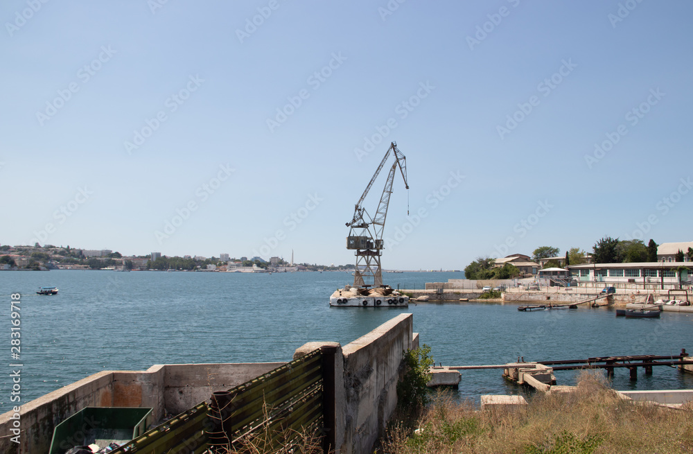 Sevastopol Bay in the summer in sunny weather. Crimea, Russia. A lot of boats and ships. Bay for boats.