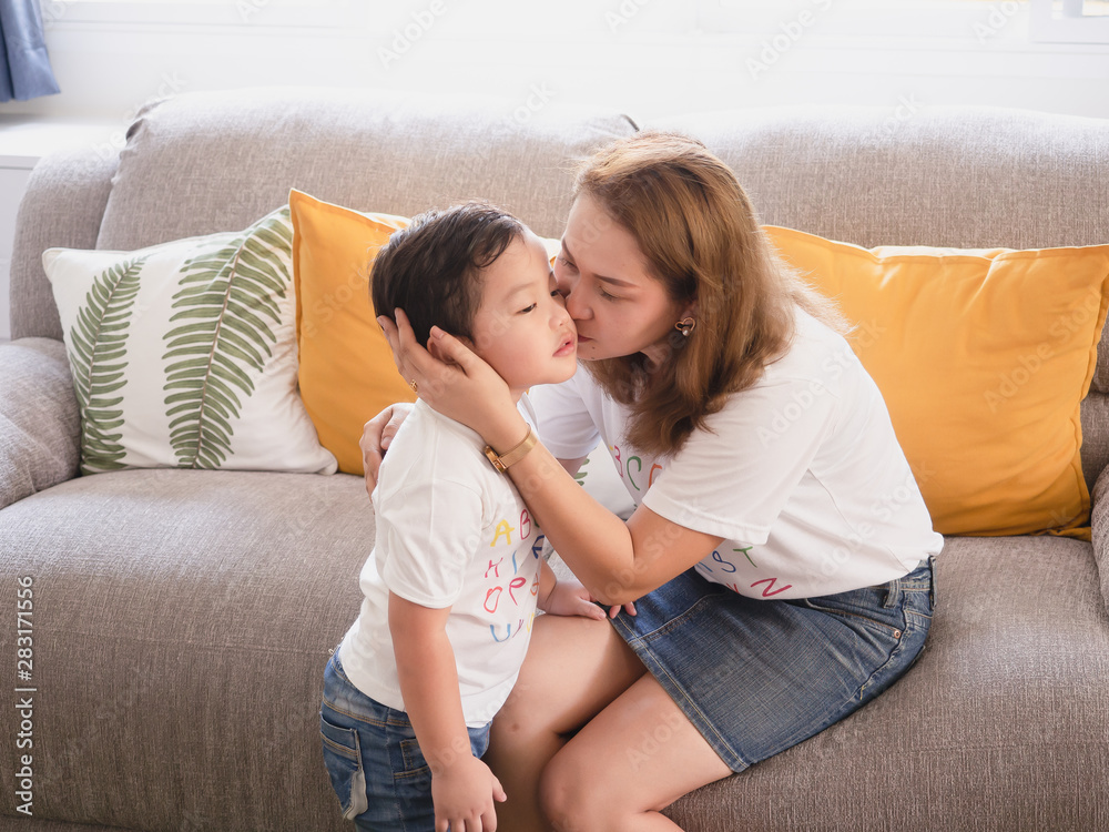 My mother cheeks her son with love My mother cheeks her son with love