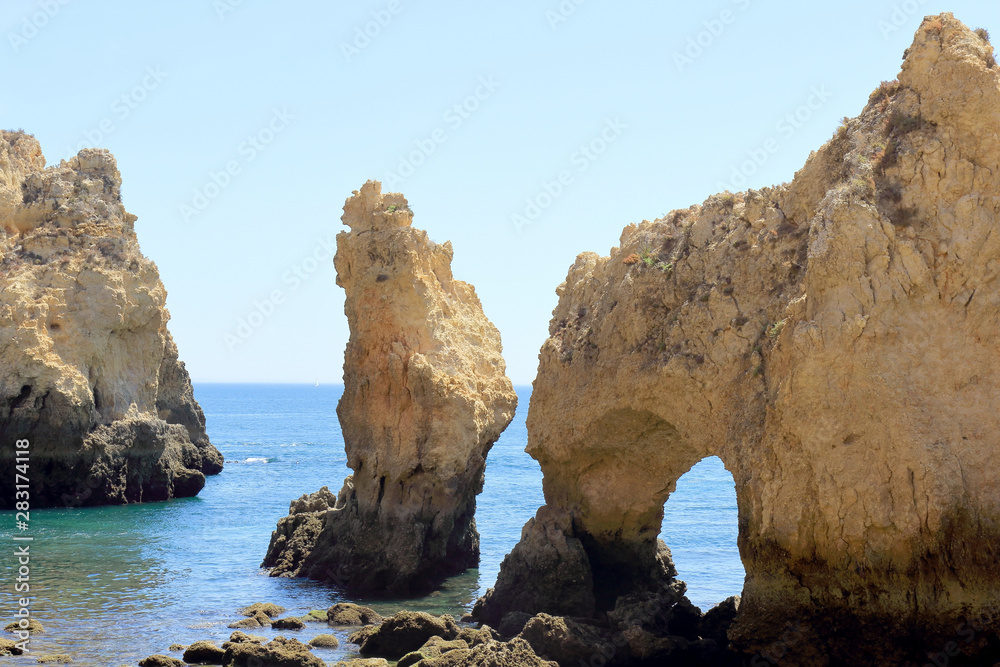 Giant limestone pillars and archways at the Ponta Da Piedade Headland