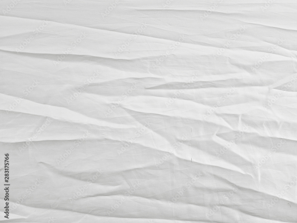 Fototapeta premium Soft white wrinkled fabric background